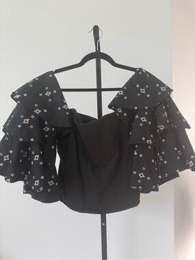Caroline Constas Black Off-Shoulder Ruffle Sleeve Top with Floral Motif